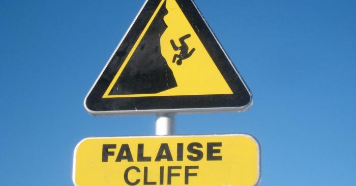 58c5b09cb8b9e_9Manfallingofcliffsign.jpg