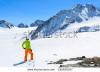 stock-photo-young-woman-alpine-skier-in-orange-pants-and-green-jacket-stands-in-fresh-snow-on-pitztal-glacier-185626547.jpg
